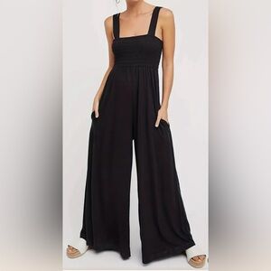Black wide leg romper/jumpsuit size large